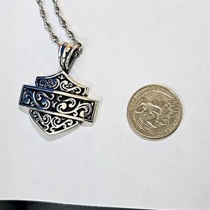 Silver tone harley davidson emblem necklace